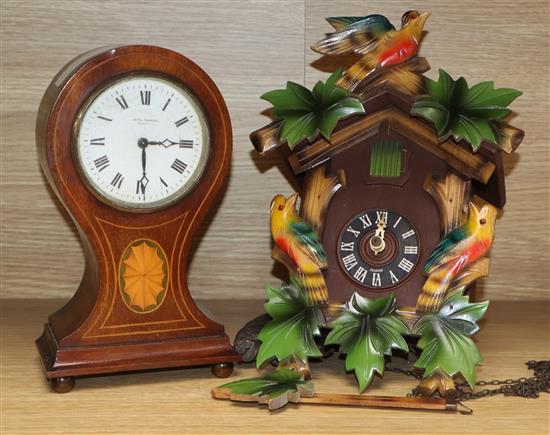 An Edwardian inlaid mahogany timepiece and a cuckoo clock tallest 23.5cm